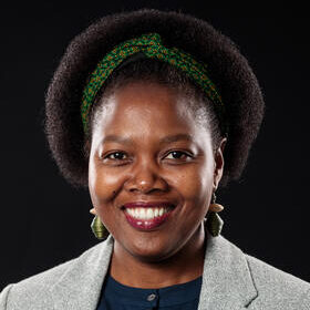 A smiling photo of Zimbabwean woman Euphemia Sibanda